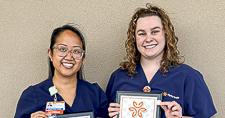 Nurses Marissa and Audi proudly display their Guardian Angel Awards, recognizing their dedication, compassion, and commitment to exceptional patient care.